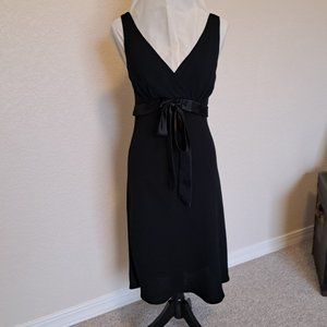 Flattering, A-line, V-neck (Front and Back), Sleeveless Black Cocktail Dress